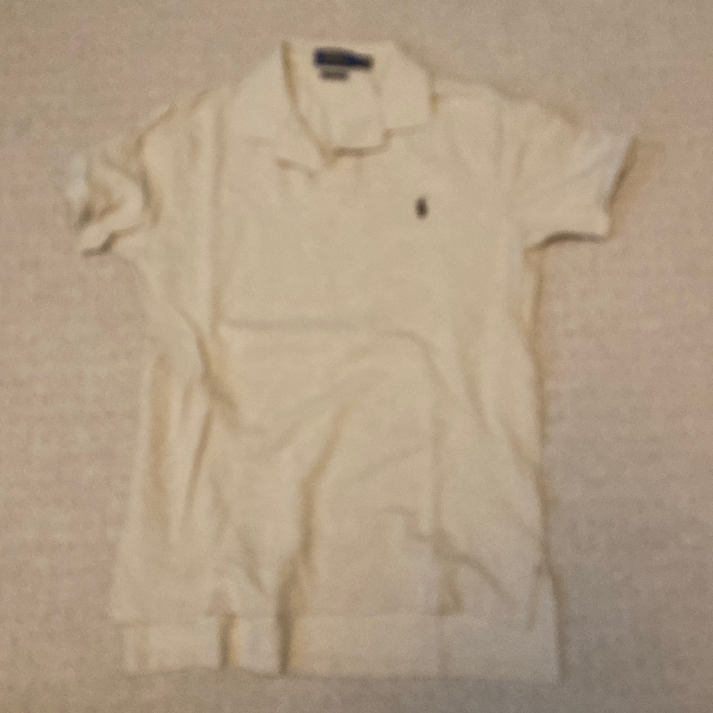 Men’s Ralph Lauren polo shirt. Maybe worn once. Great condition. Oatmeal color .